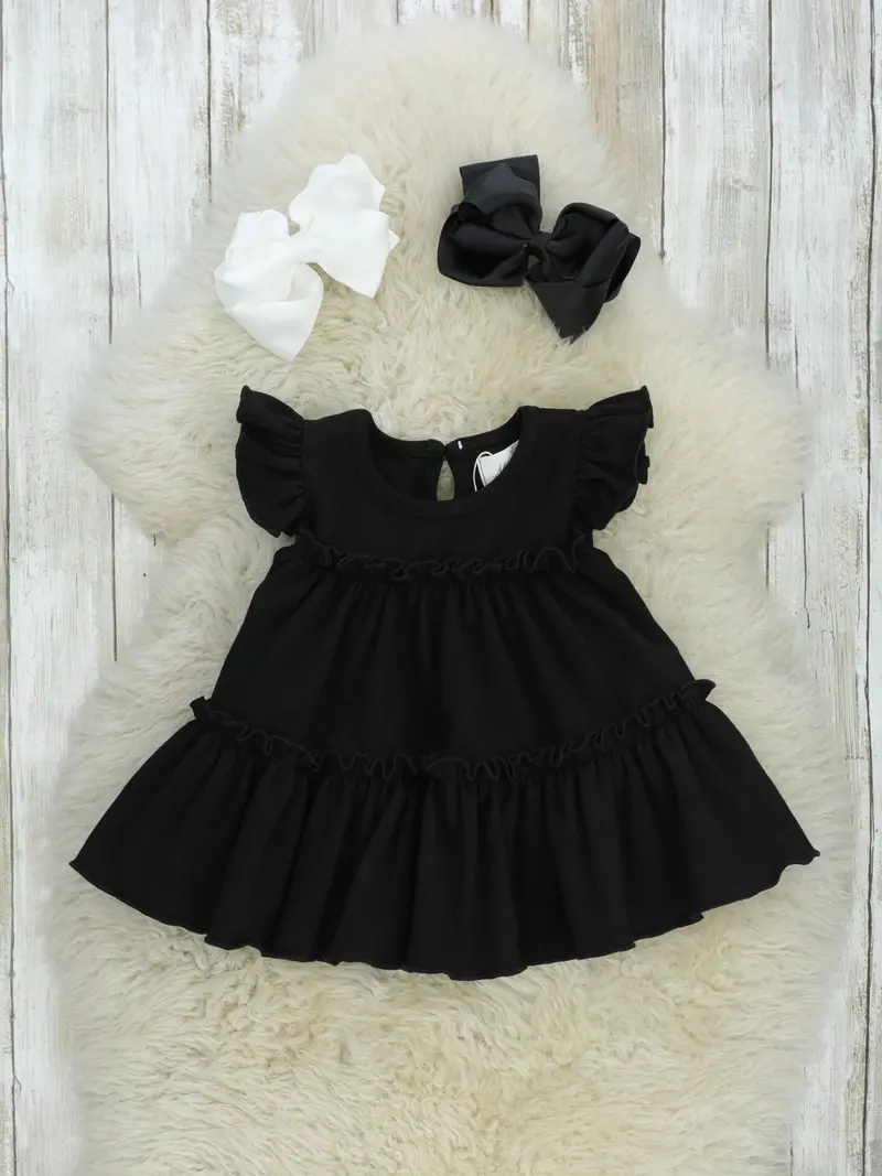 Black Cotton Tiered Tunic Featuring Ruffled Layers 1