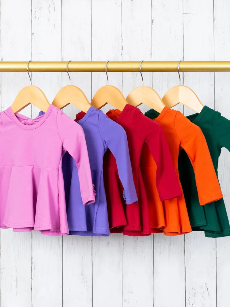 Bright-Color Peplum Top With Bow Back, Buttons, And Ruffle Sleeves 1