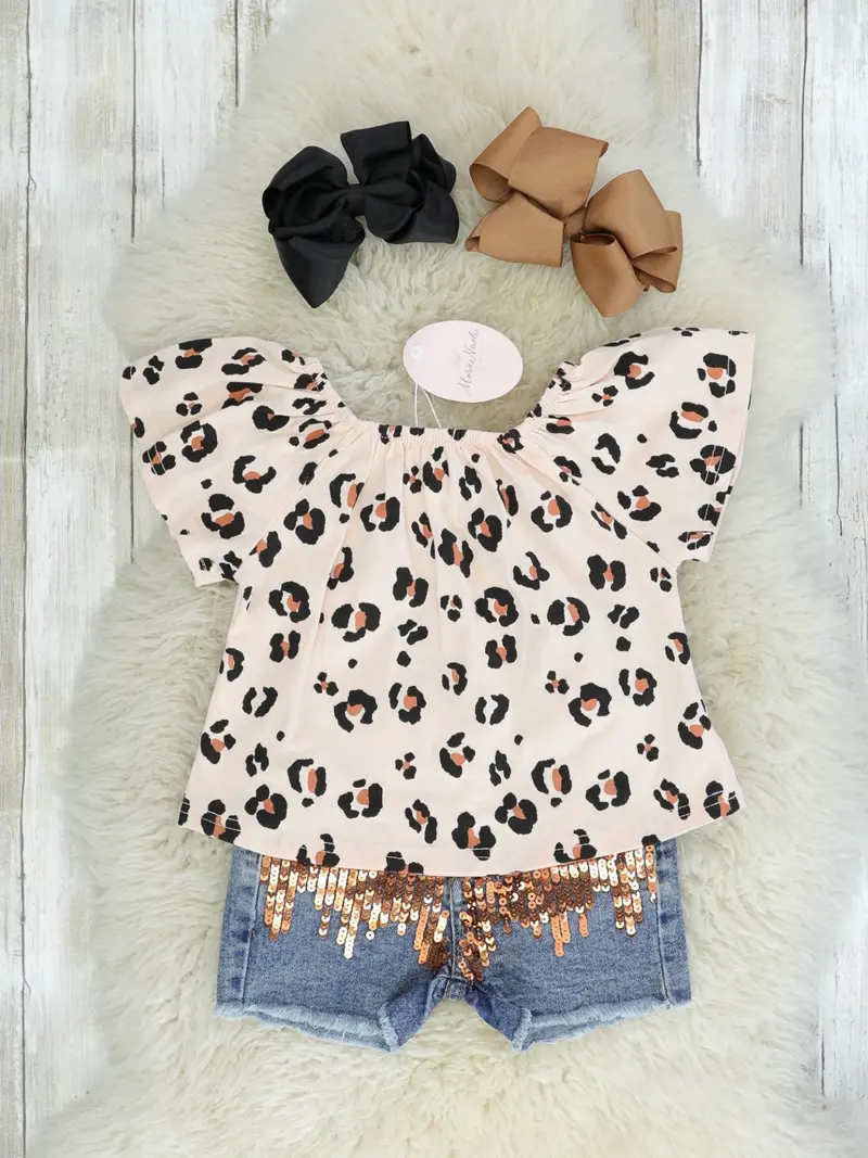 Leopard Top Paired With Sparkling Denim Bottoms 1