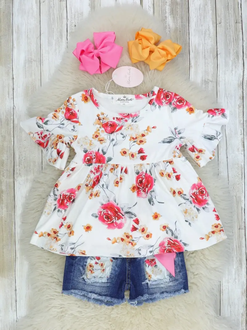 Pink Floral Ruffle Tunic With Distressed Denim Bottoms 1