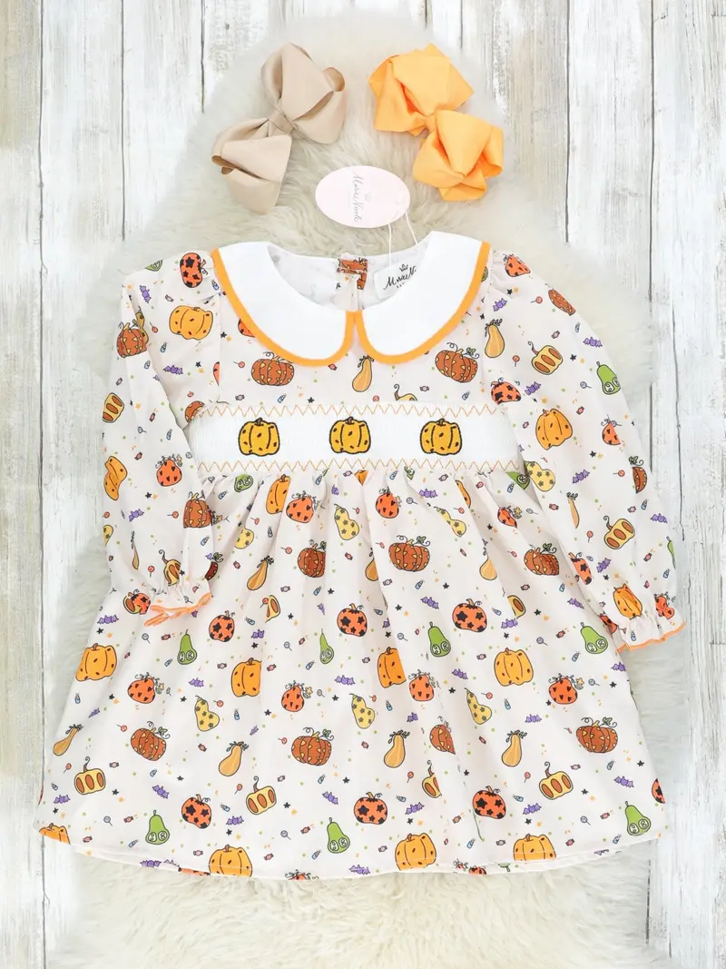 Vintage-Inspired Smocked Dress For Fall Celebrations 1